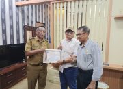 Kadis Kominfo Lampung Ganjar Jationo Terima Penghargaan PPWI: Sinergi Erat Majukan Komunikasi di Daerah